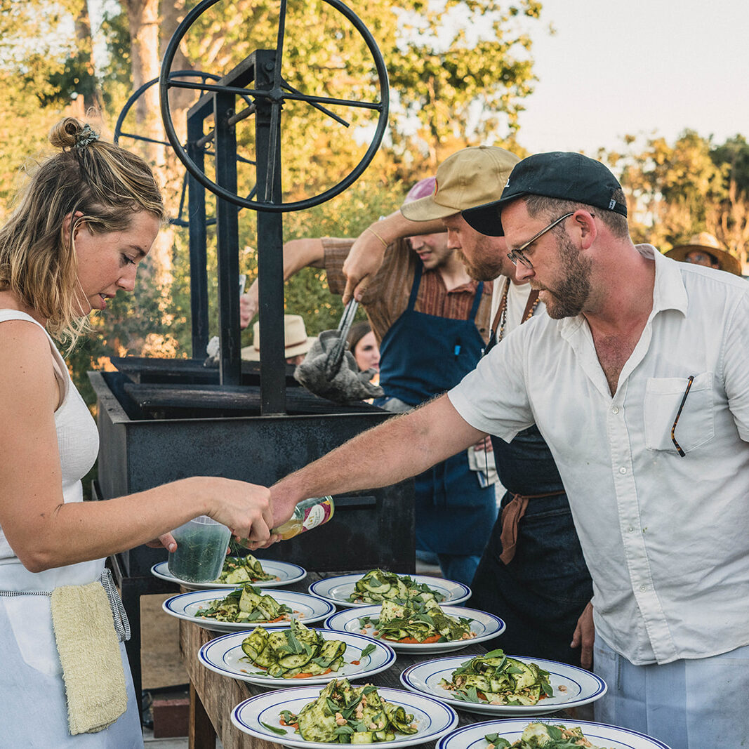 Brian Bornemann cooking at Community Table