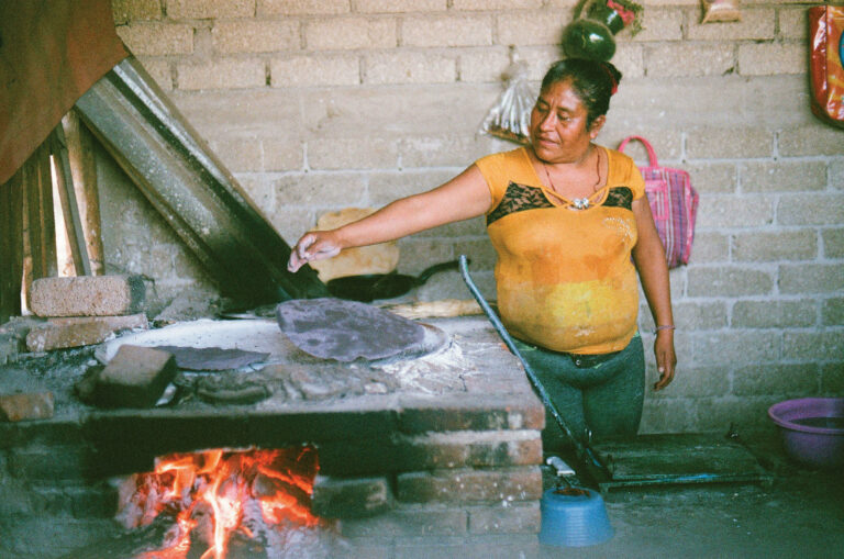 Oaxacan woman making tortillas