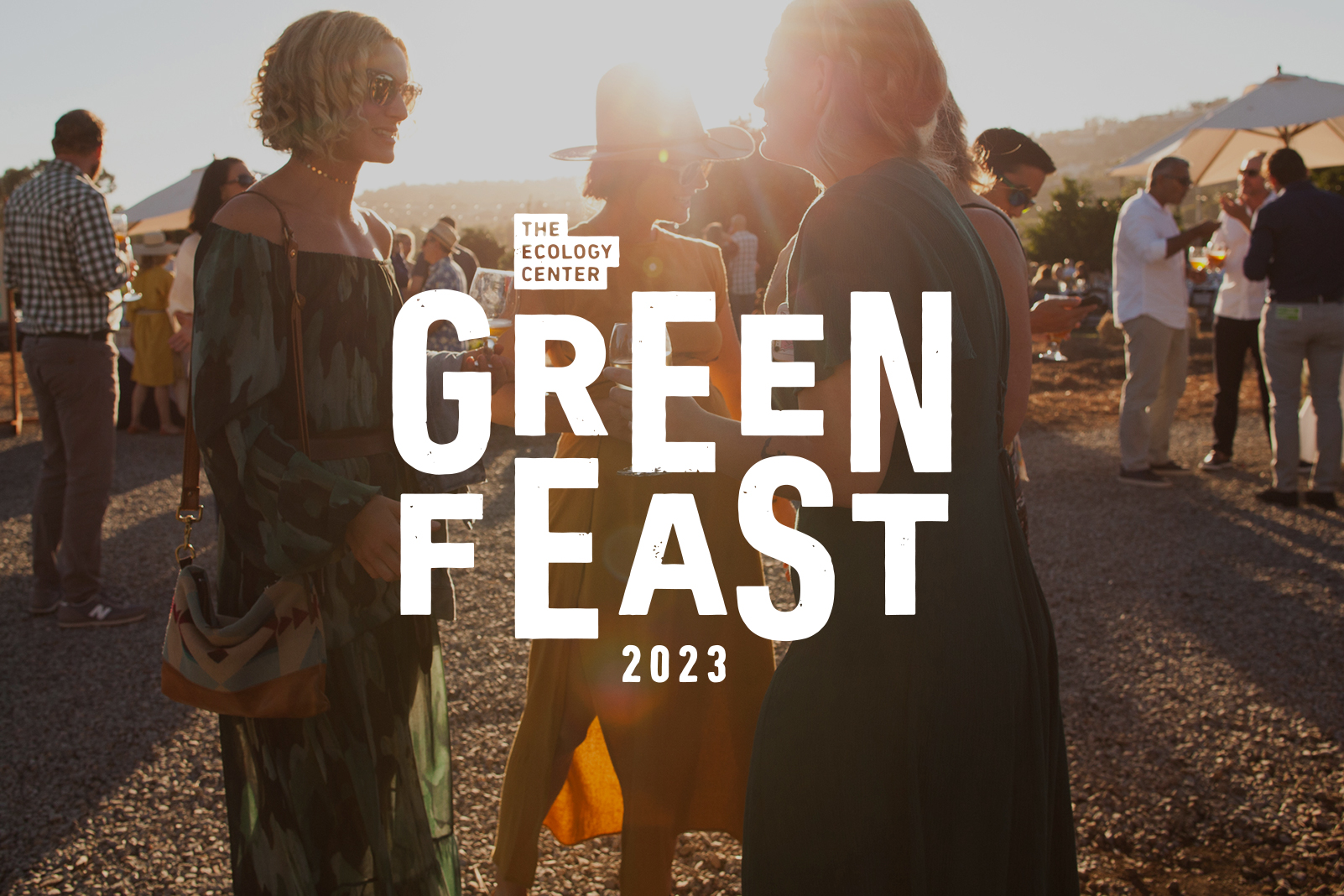Three people enjoy wine with the sun setting behind them. Green Feast logo overlayed on top
